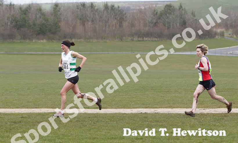 Winner Julie Briscoe (Wakefield) stretches away from Claire Martin (Telford) 35-39 age group, BMAF Cross Country, Herrington, Sunderland.